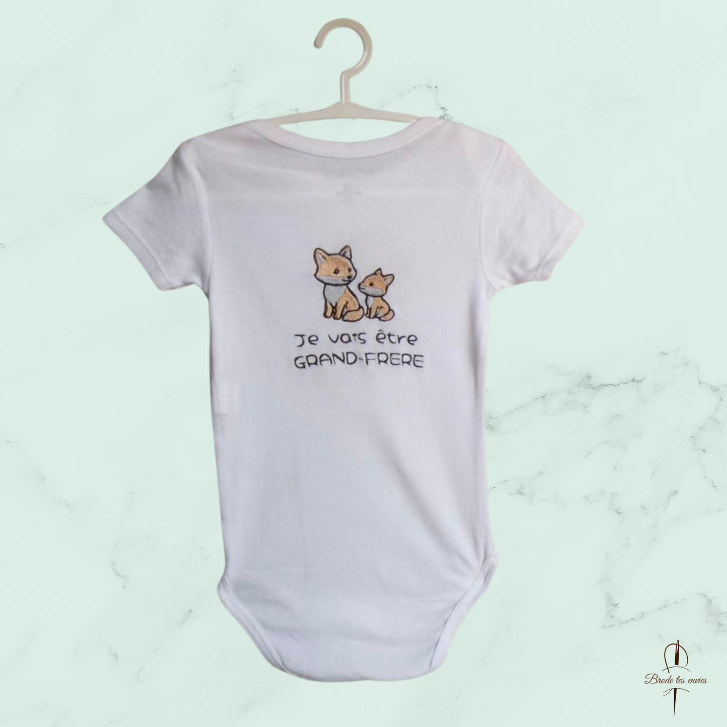 ✨ Un body blanc tendre et original - Annonce