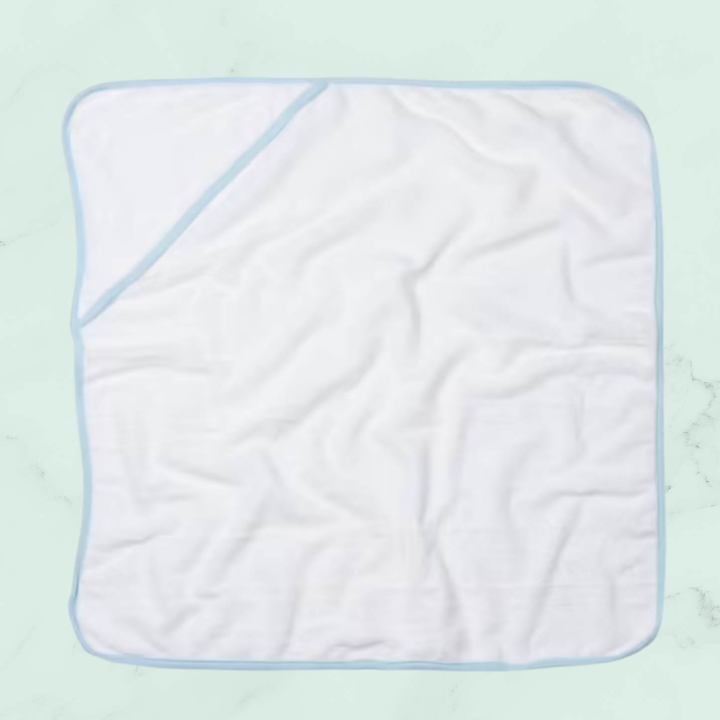 ✨ Une cape de bain douce - contour bleu